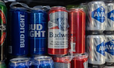 Brewer AB InBev softens third-quarter omit with percentage buyback, steerage lift