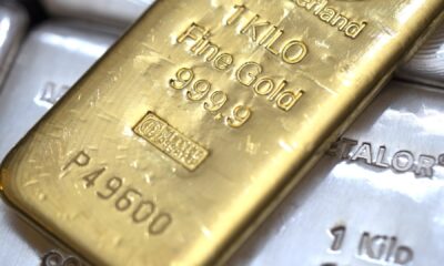 Gold slips as greenback companies; marketplace sights an important U.S. information